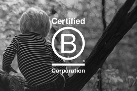 A small child climbs a tree in a forest. The 'Certified B Corporation' is overlaid on the right.