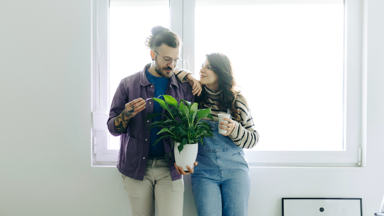 Couple with a plant